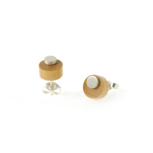 Round wooden earrings made from Australian sandalwood with a circular silver disc